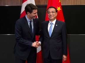 Canadian Prime Minister Justin Trudeau meets with Chinese Premier Li Keqiang before the Canada-China Annual Leaders dialogue in Singapore on Wednesday November 14, 2018.