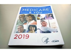 The U.S. Medicare Handbook is photographed Thursday, Nov. 8, 2018, in Washington. Seniors in many states will be able to get additional services like help with chores, safety devices and respite for caregivers next year through private 'Medicare Advantage' insurance plans. It's a sign of potentially big changes for Medicare.