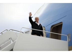 In this Nov. 17, 2018, photo, resident Donald Trump boards Air Force One for a trip to visit areas impacted by the California wildfires at Andrews Air Force Base, Md. Marathon days. Red-eye flights. Jam-packed agendas. As Trump departs Thursday, Nov. 29 to attend the G20 summit, he will be making the most of a scaled-back international schedule.