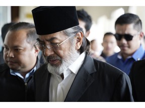 Former chief minister of Saba state on Borneo island, Musa Aman arrives at Kuala Lumpur High Court in Kuala Lumpur, Malaysia, Monday, Nov. 5, 2018. Malaysia's anti-graft agency said Monday that the former leader of a timber-rich eastern state has been arrested and will face corruption charges amid a widening crackdown on abuse by officials.