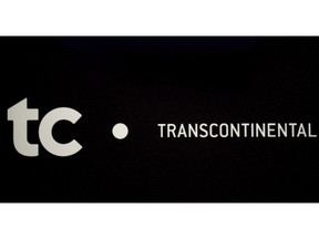 A Transcontinental sign is pictured at the company's annual general meeting in Montreal, Tuesday, March 11, 2014.