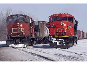Canadian National locomotives are seen in Montreal on February 23, 2015.Canadian National Railway and the union that represents its 2,100 mechanics, electricians and apprentices in Canada say they have reached a tentative collective agreement.