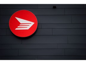 The Canada Post logo is seen on the outside the company's Pacific Processing Centre, in Richmond, B.C., on Thursday June 1, 2017. With a little over a week before Christmas, Canada Post says it is starting to catch up on parcel deliveries that were delayed by rotating strikes over the past two months.THE CANADIAN PRESS/Darryl Dyck