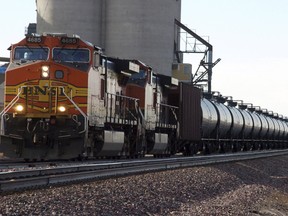 The National Energy Board says crude-by-rail exports from Canada rose to a record 327,229 barrels per day in October.