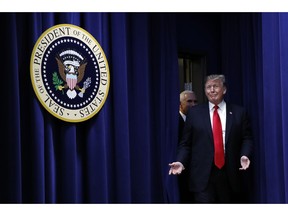 President Donald Trump, followed by Vice President Mike Pence, arrives to speak at a signing ceremony for H.R. 2, the "Agriculture Improvement Act of 2018," in the South Court Auditorium of the Eisenhower Executive Office Building, on the White House complex, Thursday, Dec. 20, 2018, in Washington.