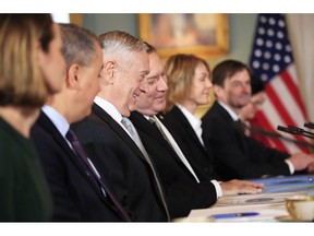 Secretary of State Mike Pompeo, fourth from left, and Defense Secretary Jim Mattis, third from left, attend a U.S.-Canada 2+2 Ministerial at the State Department in Washington, Friday, Dec. 14, 2018.