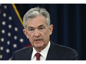 Federal Reserve Chairman Jerome Powell speak at a news conference in Washington, Wednesday, Dec. 19, 2018. The Federal Reserve is raising its key interest rate for the fourth time this year to reflect the U.S. economy's continued strength but signaling that it expects to slow hikes next year.