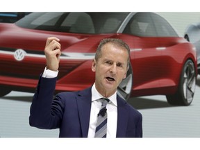 FILE - In this Aug. 1, 2018 file photo Herbert Diess, CEO of the Volkswagen stock company, addresses the media during a press conference in Wolfsburg, Germany. Automaker Volkswagen says it is on track for a new annual sales record despite troubles getting vehicles certified for new European emissions tests.