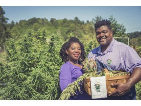 In this September 2018 photo provided by Clarenda "Cee" Stanley-Anderson, Stanley-Anderson and her husband, Malcolm Anderson Sr., pose for pictures of their hemp-farming business, Green Heffa Farms, Inc., in Liberty, N.C. The Andersons' hemp crop was wiped out by Hurricane Florence in September but with the federal legalization of hemp included in the 2018 U.S. Farm Bill, the couple plans to increase their production nearly tenfold next year. They will also have access to crop insurance for the first time.