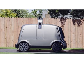 This undated image provided by The Kroger Co. shows an autonomous vehicle called the R1. Nuro and grocery chain Kroger are teaming up to bring unmanned delivery service to customers. The companies said Tuesday, Dec. 18, 2018, that Nuro's unmanned vehicle, the R1, will be added to a fleet of autonomous Prius vehicles that have run self-driving grocery delivery service in Scottsdale, Ariz., with vehicle operators since August.