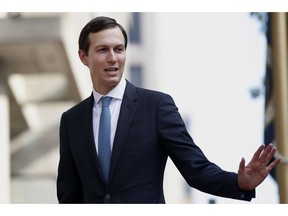 FILE - In this Aug. 29, 2018, file photo, White House Adviser Jared Kushner waves as he arrives at the Office of the United States Trade Representative in Washington. Kushner's family company plans to buy another property in a New Jersey beach town where developers can get big tax breaks thanks to a new federal program pushed by Kushner and his wife, Ivanka Trump.