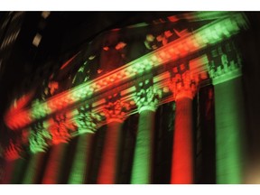 This photo made with a slow shutter speed shows the exterior of the New York Stock Exchange on Thursday evening, Dec. 20, 2018. Stocks went into another slide Thursday in what is shaping up as the worst December on Wall Street since the depths of the Great Depression, with prices dragged down by rising fears of a recession somewhere on the horizon. The Dow Jones Industrial Average dropped 464 points, bringing its losses to more than 1,700 since last Friday.