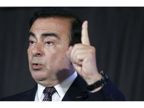 In this May 12, 2016, photo, then Nissan Motor Co. President and CEO Carlos Ghosn speaks during a joint press conference with Mitsubishi Motors Corp. in Yokohama, near Tokyo. Japanese media say Friday, Dec. 21, 2018, prosecutors press new allegation of breach of trust against Nissan ex-chair Ghosn, who is being detained in the Tokyo Detention Center.