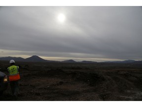 In this Tuesday, Dec. 11, 2018 a worker of the Public Power Company, PPC, operates in the South Field lignite mine near Kozani town, northern Greece. Despite warnings expressed at the current U.N. climate talks in Poland, backed by ambitious European Union renewable targets, Greece is planning to remain hooked on coal and is on course to expand its dependence on oil and gas, anxious to attract overseas investment as it emerges from a financial crisis that lasted nearly a decade.