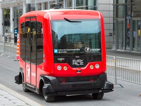 An EasyMile autonomous bus takes a short ride along a Montreal street earlier this year.