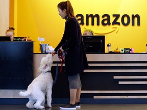 An Amazon employee in the Seattle office. Amazon.com Inc said on Tuesday it plans to create 600 new technology jobs in downtown Toronto.