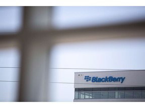 The Blackberry logo located in the front of the company's C building in Waterloo, Ont. on May 29, 2018. BlackBerry Inc. is attempting to aid in the creation of smart cities with a new service that provides the infrastructure for vehicles and traffic lights to exchange information in a secure manner. The Waterloo-based tech company says it will not charge service fees for automakers and public offices involved in smart city and connected vehicle pilots to use the Security Credential Management System service.