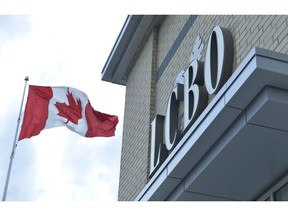 A Canadian flag flies near an under construction LCBO store in Bowmanville, Ont. on Saturday July 20, 2013. The LCBO is putting wines from Norman Hardie back on its shelves, nearly six months after it pulled the brand amid sexual harassment allegations against the popular winery owner.