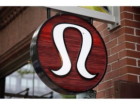 A Lululemon Athletica logo outside a store on Newbury Street in Boston.