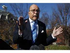 White House chief economic adviser Larry Kudlow talks with reporters about trade negotiations with China, at the White House, Monday, Dec. 3, 2018, in Washington.