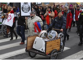 Protestors participates in a march calling for an end to fossil fuel use during the two-week COP24 global climate talks in Katowice, Poland, on Saturday, Dec.8, 2018.