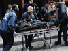 In this dated December 11, 2010 filed photo shows medical examiners remove the body of Mark Madoff, the son of disgraced financier Bernard Madoff, after he hanged himself in his New York apartment on the second anniversary of his father’s arrest for perpetrating Wall Street’s biggest ever fraud, in New York.