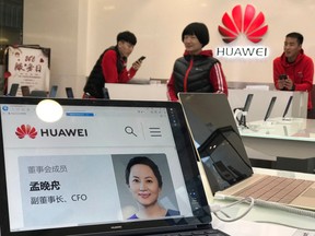 A profile of Huawei's chief financial officer Meng Wanzhou is displayed on a Huawei computer at a Huawei store in Beijing, China, Thursday, Dec. 6, 2018.