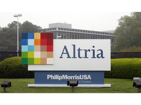 FILE - This April 23, 2008, file photo, shows the Altria Group Inc. corporate headquarters in Richmond, Va. The potential entry of one of the world's largest tobacco companies into the marijuana business is sending the shares of Cronos group rocketing this morning. Cronos is a Canadian cannabis company, which confirmed late Monday, Dec. 3, 2018, that it is in talks with Altria group about a possible investment.