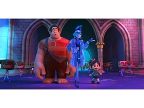 FILE - This image released by Disney shows characters, from left, Ralph, voiced by John C. Reilly, Yess, voiced by Taraji P. Henson and Vanellope von Schweetz, voiced by Sarah Silverman in a scene from "Ralph Breaks the Internet." On a quiet weekend at the box office, "Ralph Breaks the Internet" was No. 1 for the third straight week, while the upcoming DC Comics superhero film "Aquaman" made a huge splash in Chinese theaters. (Disney via AP, File)