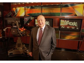 FILE - In this Sept. 29, 2006 file photo, Fox News CEO Roger Ailes poses at Fox News in New York.  A new documentary, "Divide and Conquer: The Story of Roger Ailes," directed by Alexis Bloom, deconstructs the rise and fall of the late head of Fox News Channel. The film opens in theaters on Dec. 6, as well as VOD, Apple iTunes, and Amazon streaming services.