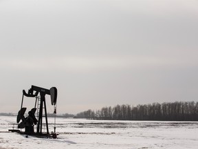 An idle oil pump jack is seen in a field near Leduc, Alta.