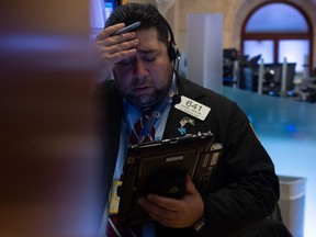 A trader reacts to a stock sell-off at the New York Stock Exchange in November.
