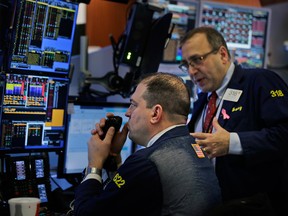 Traders work on the floor of the New York Stock Exchange in New York, Monday, Dec. 24, 2018.