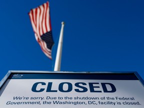 A sign is displayed on a government building that is closed because of a U.S. government shutdown in Washington.