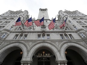 FILE - This Dec. 21, 2016 file photo shows the Trump International Hotel at 1100 Pennsylvania Avenue NW, in Washington. The attorneys general of the District of Columbia and Maryland plan to file subpoenas seeking records from the Trump Organization, the IRS and other entities in their lawsuit accusing Donald Trump of profiting off the presidency.