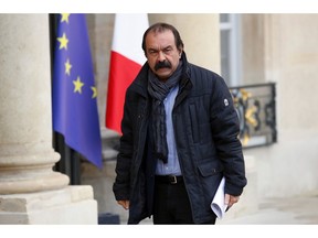 CGT labor union leader Philippe Martinez arrives for a meeting with French President Emmanuel Macron, with local, national political leaders, unions, business leaders and others to hear their concerns after four weeks of protests, at the Elysee Palace in Paris, Monday, Dec. 10, 2018. French President Emmanuel Macron is preparing to speak to the nation at last after increasingly violent "yellow vest" protests against his leadership.