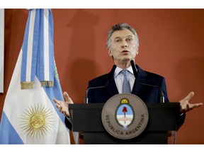 FILE - In this Sept. 27, 2018 file photo, Argentina's President Mauricio Macri speaks from the government house in Buenos Aires, Argentina. Macri told The Associated Press in a Dec. 3, 2018 interview that Argentina struck about $8 billion in investment deals with other nations on the sidelines of the G-20 summit, most focused on energy and infrastructure.