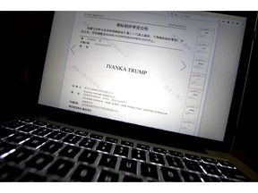 FILE - In this Nov. 6, 2018, file photo, a document from the website of China's Trademark Office of the State Administration for Industry and Commerce showing provisional approval of a trademark for Ivanka Trump Marks LLC is seen on a computer screen in Beijing. China has greenlighted five more Ivanka Trump trademarks as trade talks with her father's administration intensify. They cover a range from wedding dresses to insurance and art valuation services.