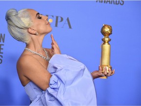 Lady Gaga poses in the press room with the award for best original song, motion picture for "Shallow" from the film "A Star Is Born" at the 76th annual Golden Globe Awards at the Beverly Hilton Hotel on Sunday, Jan. 6, 2019, in Beverly Hills, Calif.