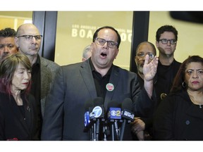 United Teachers Los Angeles union president Alex Caputo-Pearl talks to reporters outside Los Angeles Unified School District headquarters, following a day of negotiations with the LAUSD Monday, Jan. 7, 2019. Teachers in the nation's second-largest school district will strike this week if there's no settlement in long-running contract negotiations that resumed with the superintendent and the head of the union coming to the table Monday in a last-ditch effort to avert a walkout in Los Angeles.