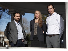 In this Thursday, Dec. 20, 2018, photo, attorneys, from left, David Seligman, Nina DiSalvo and Alexander Hood of Denver's Towards Justice are shown outside the organization's office east of downtown Denver. In a deal filed Wednesday, Jan. 9, 2019, in federal court in Denver, the companies that brought workers from around the globe to provide low-cost child care for American families have offered $65.5-million to settle a class-action lawsuit with nearly 100,000 au pairs.