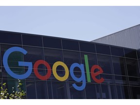 This Tuesday, July 19, 2016, file photo shows the Google logo at the company's headquarters in Mountain View, Calif. Human rights groups say they will protest outside Google offices in Canada in hopes of forcing the tech giant to confirm it has cancelled a controversial project with the Chinese government.
