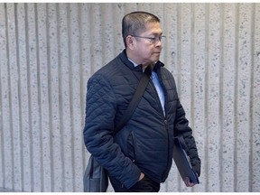 Hector Mantolino, charged with not paying Filipino temporary workers their required wages, arrives at Nova Scotia Supreme Court at his sentencing in Halifax on Friday, Jan. 4, 2019. Mantolino, owner and operator of Mantolino Property Services Ltd., entered a guilty plea to charges under the Immigration and Refugee Protection Act following a Canada Border Services Agency investigation.