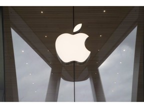 The Apple logo is displayed at the Apple store in the Brooklyn borough of New York, Thursday, Jan. 3, 2019. Apple Inc. will debut its Apple News app in Canada early next week. The U.S.-based tech giant's app curates news and can be set up to provide stories based on a user's interests.