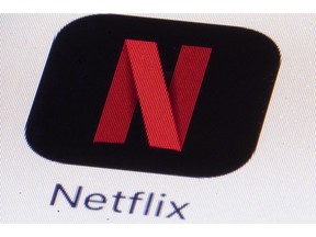 The Netflix logo is shown on an iPhone in Philadelphia on Monday, July 17, 2017. Canada's broadcast regulator, and its public broadcaster, want federal lawmakers to ensure foreign content providers, such as Netflix, Youtube and Amazon Prime, pay their fair share into producing Canadian content.