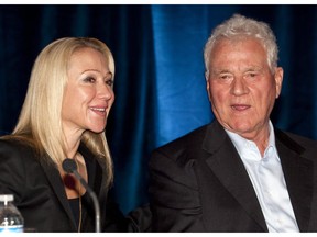 Magna International Inc. chairman Frank Stronach, right, and executive vice-chair Belinda Stronach chat at the company's annual general meeting in Markham, Ont., on May 6, 2010.