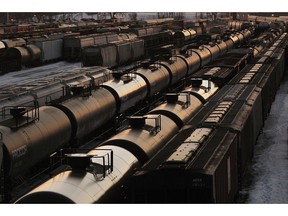 Rail cars wait for pickup in Winnipeg on March 23, 2014. The National Energy Board says crude-by-rail exports from Canada grew at a slower pace in November but still reached a new record high. It says a Canada exported 330,402 barrels per day of oil, up about one per cent from October's total of 327,229 bpd but more than double the 148,311 moved in November 2017.