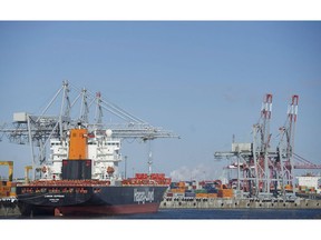 Container ships are shown in the Port of Montreal on January 4, 2016. The St. Lawrence Seaway floated its highest cargo volumes since 2007 last year, propelled by a spike in grain shipments and global tariff wars that worked in Canada's favour. The St. Lawrence Seaway Management Corporation says traffic hit 40.9 million tonnes in 2018, a seven per cent year-over-year increase.