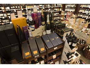 High-end wine and sparkling wine is on display at a B.C. liquor store in Vancouver on December 19, 2008. Canada's interim competition commissioner urges B.C. to change its liquor policy to allow more competition, sparking innovation and lower prices.