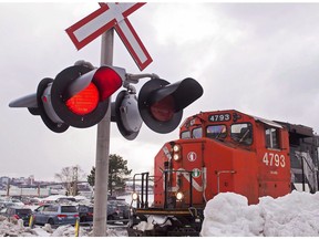 A CN locomotive moves in the railway yard in Dartmouth, N.S. on Monday, Feb. 23, 2015. The Federal Court of Appeal has upheld a ruling that found a lower court has jurisdiction to determine the damages Canadian National Railway Co. must pay after breaching its service obligations to a Prairie grain shipping company during a bumper crop five years ago.